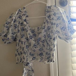 a white floral crop top size M